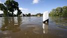 A general view shows the main street after the river Elbe flooded the village of Kabelitz, north of Magdeburg June 10, 2013. Tens of thousands of people have been forced to leave their homes and there have been at least a dozen deaths as a result of floods that have hit Germany, Austria, Slovakia, Poland and the Czech Republic over the past week. REUTERS/Fabrizio Bensch (GERMANY - Tags: DISASTER ENVIRONMENT)