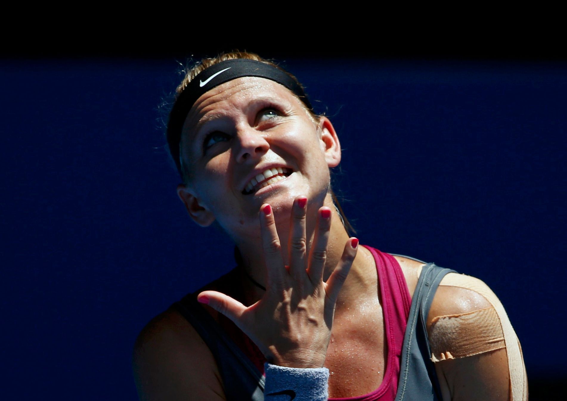 Lucie Safarova of the Czech Republic reacts during her women's singles match against Li Na of China at the Australian Open 2014 tennis tournament in Melbourne