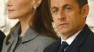 French President Nicolas Sarkozy and his new wife Carla Bruni watch the Guard of Honour review at Windsor Castle in Windsor, southern England March 26, 2008. REUTERS/Kieran Doherty (BRITAIN)