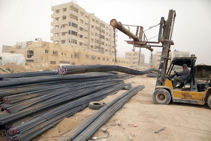 Egypt - Gaza - Palestinian Tunnel in Rafah Gaza, April. 3, 2013 – Palestinian workers gets iron out of the tunnel smuggling between the Hamas-ruled Gaza Strip and Egypt in the southern Gaza Strip city of Rafah on April 3, 2013. The Egyptian army started to knock down Gaza smuggling tunnels last month after a high Egyptian court has urged the authorities in Cairo to tear down all the tunnels along the borders between Gaza and Egypt. Ismail Haniyeh discussed the Prime Minister of the Hamas government with Egyptian President Mohammed Mursi, a few days before the issue of smuggling tunnels. by Wissam Nassar.