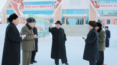 Kim Čong-un se svými spolupracovníky.