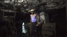 A miner stands inside an underground Barora coal mine at Dhanbad district in the eastern Indian state of Jharkhand September 17, 2012. With oil and gas output disappointing and hydropower at full throttle, Asia's third-largest economy still relies on coal for most of its vast energy needs. About 75 percent of India's coal demand is met by domestic production and, according to government plans, that won't change over the next five years. Picture taken September 17, 2012. To match INDIA-COAL/ REUTERS/Ahmad Masood (INDIA - Tags: BUSINESS EMPLOYMENT ENERGY SOCIETY ENVIRONMENT) Published: Říj. 21, 2012, 10:08 odp.