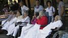 People wait outside hospital after an earthquake in Crevalcore near Modena