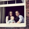 Britain's Prince William, Catherine, Duchess of Cambridge and their son Prince George, are seen in this photograph taken in Kensington Palace, London