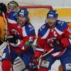 Hokejisté Lva Praha Jakub Voráček (vlevo) a Jiří Novotný cloní před Antonem Chudobinem v utkání KHL 2012/13 proti Atlantu Mytišči.,