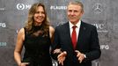 Former Ukranian pole vaulter Sergey Bubka, accompanied by his wife Lilia Tutunik, poses as he arrives to the ceremony of the Laureus World Sports Awards 2020 in Berlin, G