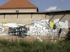 Masker začínal na ulici. Na snímku z roku 2009 je jeho graffiti na zdi bývalé vojenské střelnice v Uherském Hradišti.