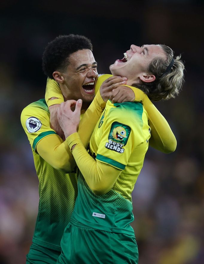 Soccer Football - Premier League - Norwich City v Manchester City - Carrow Road, Norwich, Britain - September 14, 2019   Norwich City's Jamal Lewis and Todd Cantwell cele