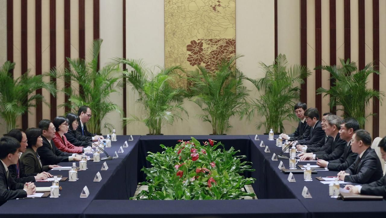 Delegáti Tchaj-wanu a Číny na jednání