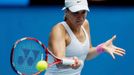 Sabine Lisicki of Germany hits a return to Monica Niculescu of Romania during their women's singles match at the Australian Open 2014 tennis tournament in Melbourne Janua