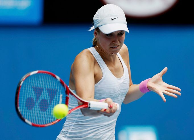 Sabine Lisicki of Germany hits a return to Monica Niculescu of Romania during their women's singles match at the Australian Open 2014 tennis tournament in Melbourne Janua