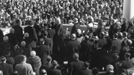 Former U.S. Supreme Court Chief Justice Earl Warren (C) administers the oath of office to former President John F. Kennedy (center-left) during inauguration ceremonies at the Capitol in Washington, in this handout photograph taken on January 20, 1961.