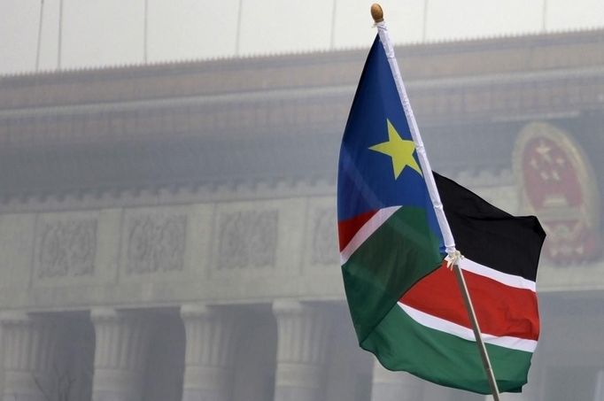 South Sudan's national flag flutters in front of the Great Hall of the People at Tiananmen square in Beijing