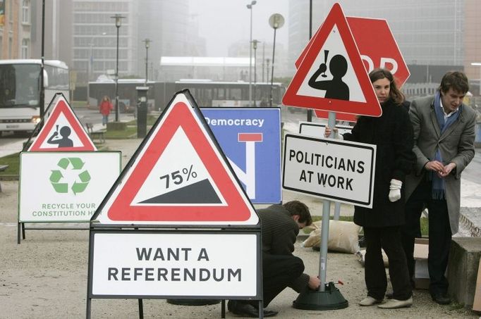 Spoof road signs are erected in front of the European Commission headquarters in Brussels December 13, 2007. The signs were placed by the British campaigners calling for a referendum on the European Treaty being signed in Lisbon today. European Union leaders will sign the 'Treaty of Lisbon' on Thursday to modernise the bloc's institutions and put behind them a difficult reform process that has lasted nearly a decade. REUTERS/Thierry Roge