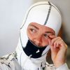 Mercedes Formula One driver Nico Rosberg wipes his eye durin