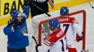 Finland's Jarkko Immonen (L) celebrates after scoring a goal against Czech Republic during their men's ice hockey World Championship semi-final game at Minsk Arena in Min