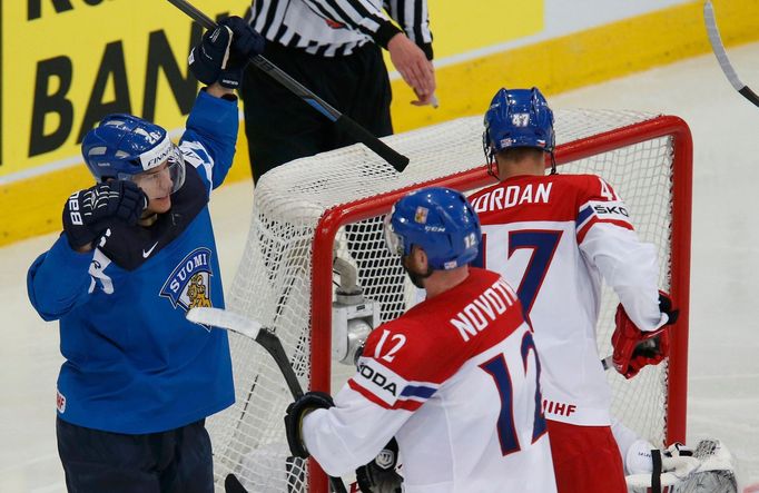 Finland's Jarkko Immonen (L) celebrates after scoring a goal against Czech Republic during their men's ice hockey World Championship semi-final game at Minsk Arena in Min