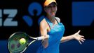 Belinda Bencic of Switzerland hits a return to Li Na of China during their women's singles match at the Australian Open 2014 tennis tournament in Melbourne January 15, 20