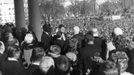 Former U.S. Supreme Court Chief Justice Earl Warren (C) administers the oath of office to former President John F. Kennedy (center-left) during inauguration ceremonies at the Capitol in Washington, in this handout photograph taken on January 20, 1961.