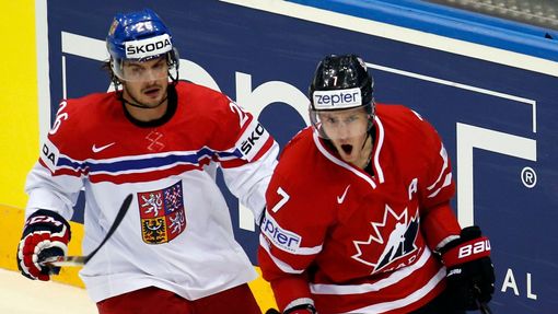 Canada's Kyle Turris (R) celebrates his goal next to Martin Zatovic of the Czech Republic (L) during the second period of their men's ice hockey World Championship group