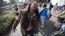 A person dressed like a zombie walks during the 2015 Comic-Con International Convention in San Diego