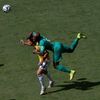 Colombia's Gutierrez and Ivory Coast's Zokora fight for the ball during their 2014 World Cup soccer match in Brasilia