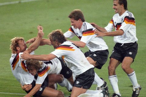 FILE PHOTO: West Germany's Brehme is mobbed by teammates after he scored the only goal of the World Cup final against Argentina on a penalty kick