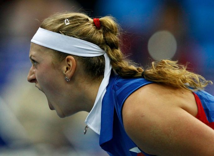 Česká tenistka Petra Kvitová slaví vítězství ve finále Fed Cupu 2011 proti Rusku.