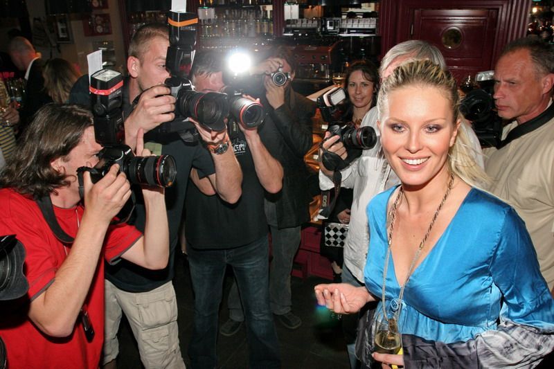 Simona Krainová a fotografové