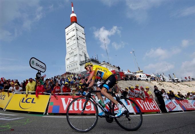 Race leader's yellow jersey Team Sky rider Christopher Froome of Britain cycles to win the 242.5 km fifteenth stage of the centenary Tour de France cycling race from Givo