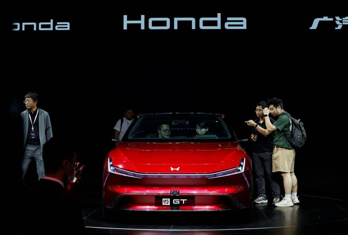 Visitors look at the Honda Ye GT electric vehicle displayed at the Beijing International Automotive Exhibition, or Auto China 2024, in Beijing, China, April 25, 2024. REU