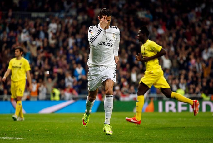 Real Madrid's Cristiano Ronaldo celebrates his goal against Villarreal during their Spanish first division soccer match at Santiago Bernabeu stadium in Madrid