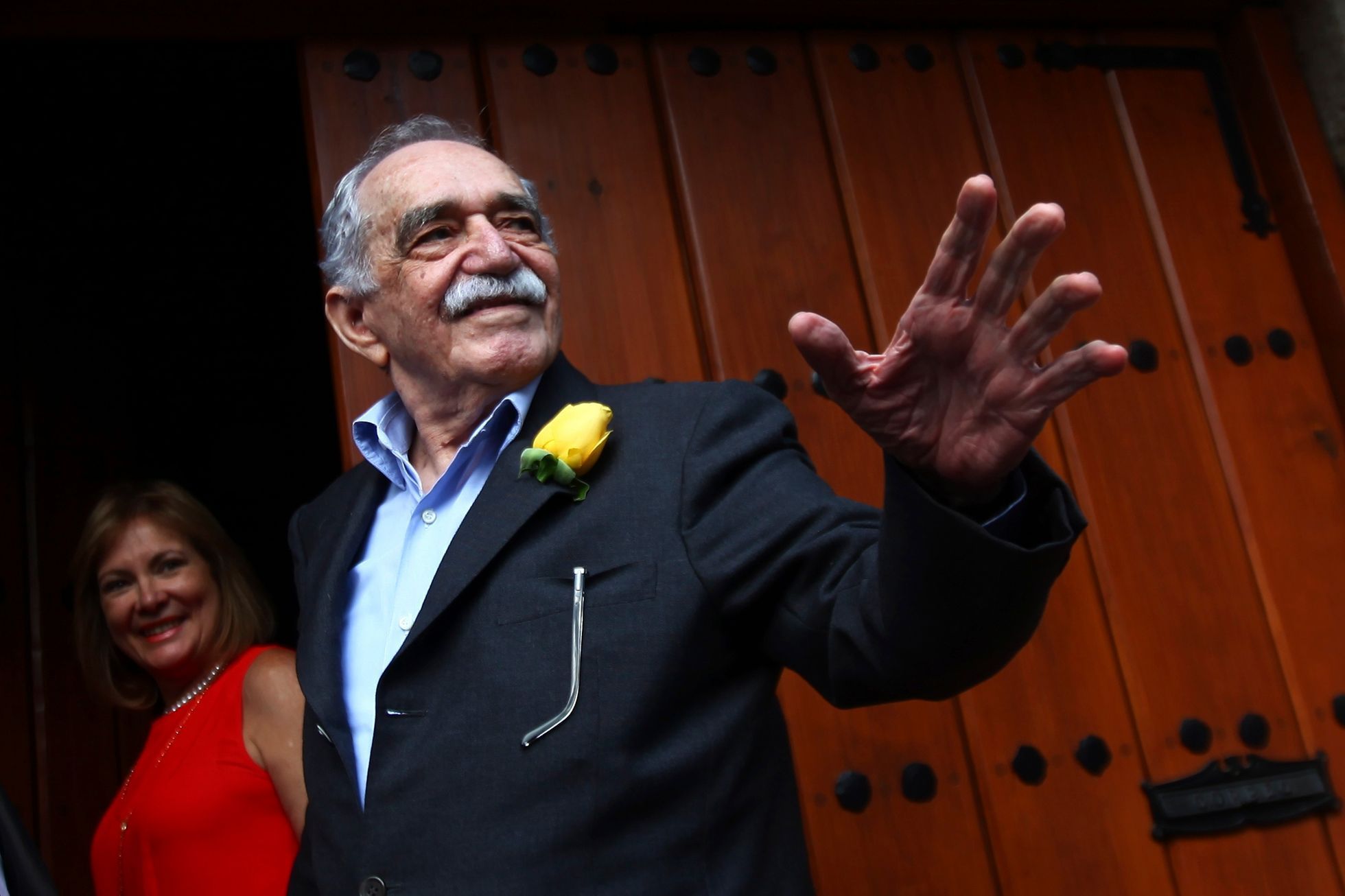 Gabriel Garcia Marquez greets journalists and neighbours on his birthday outside his house in Mexico City