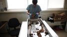 Senior Forensic Anthropologist Dragana Vucetic of the International Commission on Missing Persons (ICMP) works on trying to identify the remains of a victim of the Srebrenica massacre, at the ICMP centre near Tuzla July 9, 2012. Some 520 recently discovered Bosnian Muslim victims' remains from the Srebrenica massacre will be buried on July 11 at the Memorial center in Potocari. REUTERS/Dado Ruvic (BOSNIA AND HERZEGOVINA - Tags: CIVIL UNREST DISASTER) Published: Čec. 9, 2012, 2:40 odp.