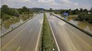 A combination of three images taken June 7, June 8 and June 10, 2013 (from top) show the A3 motorway flooded, partially flooded and after the floods of the Danube subsided near Deggendorf. Tens of thousands of Germans, Hungarians and Czechs were evacuated from their homes on Wednesday as soldiers raced to pile up sandbags to hold back rising waters in the region's worst floods in a decade. REUTERS/Wolfgang Rattay (GERMANY - Tags: DISASTER ENVIRONMENT TRANSPORT)