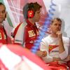 Ferrari Formula One driver Sebastian Vettel of Germany reacts in the team garage during the third practice session of the Australian F1 Grand Prix at the Albert Park circuit in Melbourne