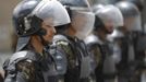 Riot policemen stand guard outside the French embassy in Sanaa September 20, 2012. A French magazine ridiculed the Prophet Mohammad on Wednesday by portraying him naked in cartoons, threatening to fuel the anger of Muslims around the world who are already incensed by a California-made video depicting him as a lecherous fool. REUTERS/Khaled Abdullah (YEMEN - Tags: POLITICS CIVIL UNREST RELIGION) Published: Zář. 20, 2012, 10:51 dop.