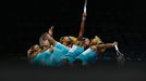 Serena Williams of the U.S. serves against Caroline Wozniacki of Denmark during their WTA Finals singles semi-final tennis match at the Singapore Indoor Stadium October 2