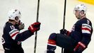 Tyler Johnson of the U.S. celebrates his goal against Finland with team mate Craig Smith (L) during the third period of their men's ice hockey World Championship Group B