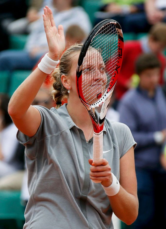 Petra Kvitova of the Czech Republic reacts after winning her women's singles match against Marina Erakovic of New Zealand at the French Open tennis tournament at the Rola