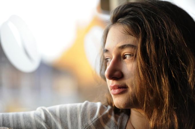 Paraskevi Kapetanios poses for a photograph at a coffee shop in Potters Bar, on the outskirts of London