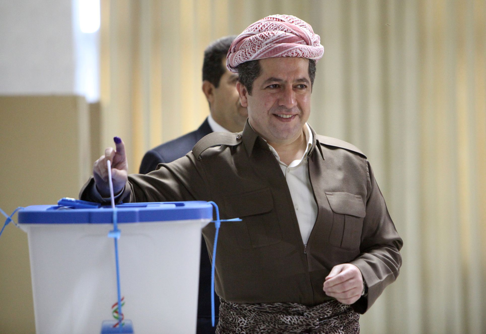 Kurdský vůdce Masúd Barzání hlasuje v referendu o nezávislosti.
