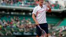 Guillermo Garcia-Lopez of Spain reacts during his men's singles match against Stanislas Wawrinka of Switzerland at the French Open tennis tournament at the Roland Garros