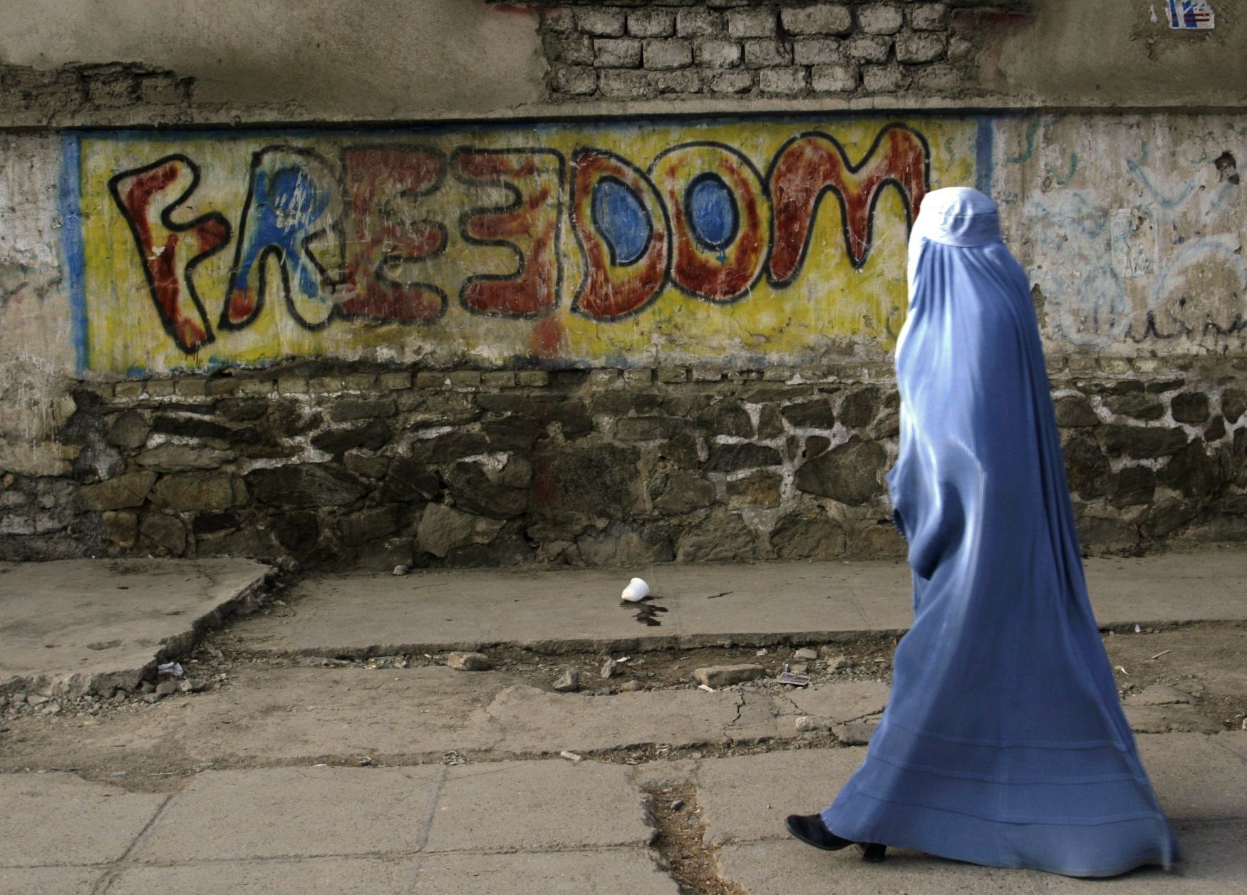 Afghánská žena v burce - islám