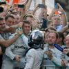 Second placed Mercedes Formula One driver Rosberg of Germany shakes hand with his team members after the first Russian Grand Prix in Sochi