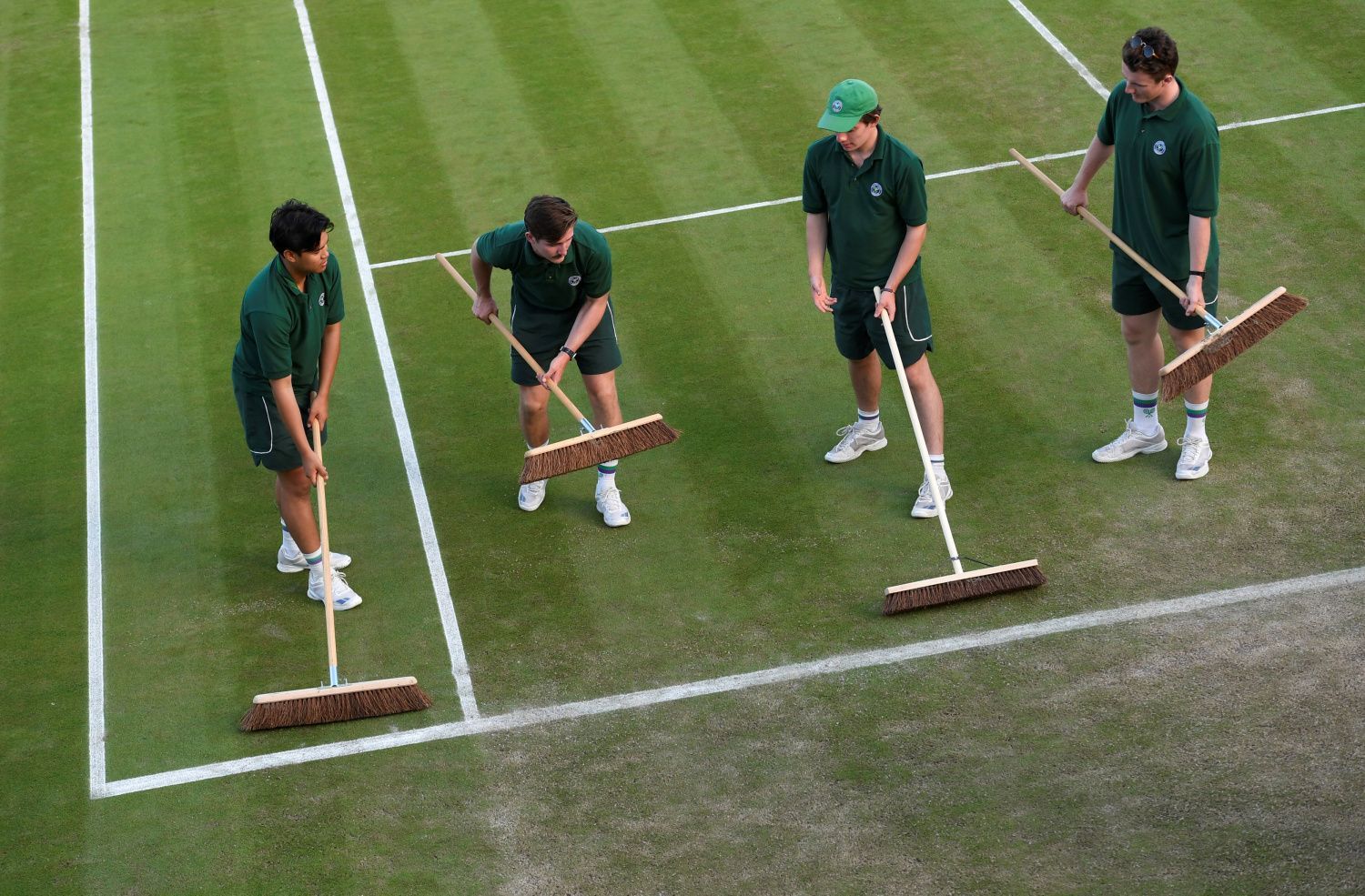 První kolo Wimbledonu 2017: úklid  kurtu