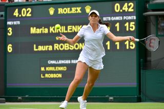 Laura Robson of Britain hits a return to Maria Kirilenko of Russia in their women's singles tennis match at the Wimbledon Tennis Championships, in London June 25, 2013. R