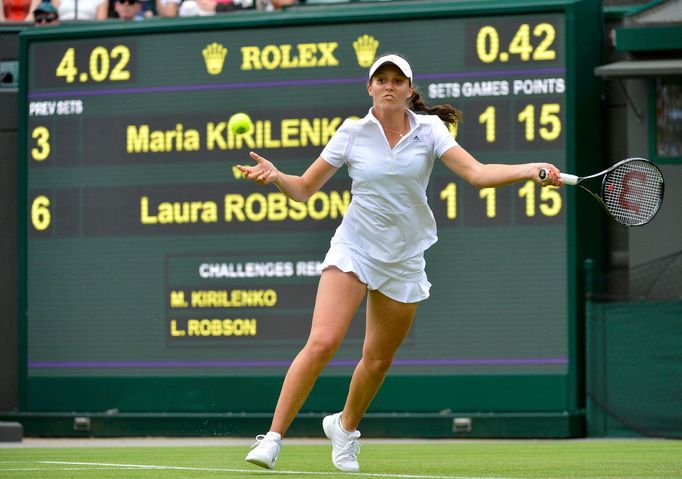 Laura Robson of Britain hits a return to Maria Kirilenko of Russia in their women's singles tennis match at the Wimbledon Tennis Championships, in London June 25, 2013. R