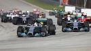 Mercedes Formula One driver Lewis Hamilton of Britain leads the pack during the Malaysian F1 Grand Prix at Sepang International Circuit outside Kuala Lumpur, March 30, 20