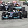 Mercedes Formula One driver Hamilton of Britain leads the pack during the Malaysian F1 Grand Prix at Sepang International Circuit outside Kuala Lumpur